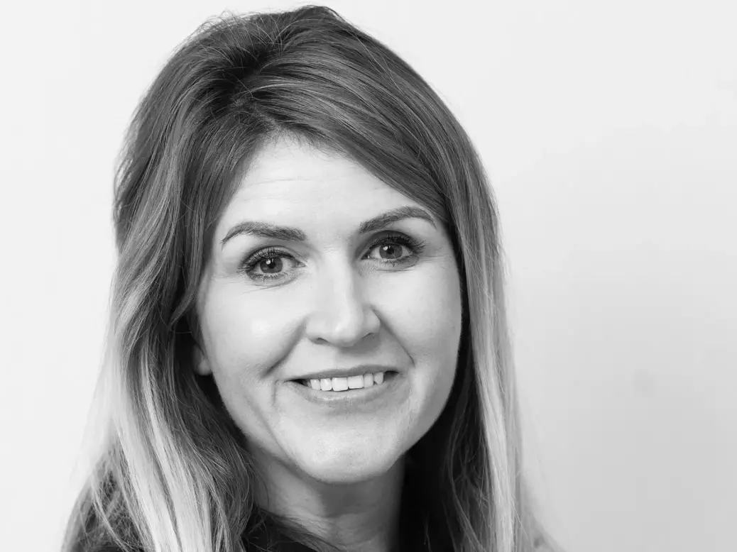 Black and white headshot of Caroline Fenner, new Pink News chief revenue officer